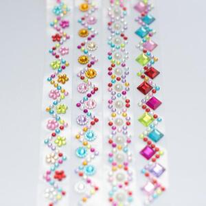 4 ROULEAUX STRASS ADHÉSIFS ASSORTIS